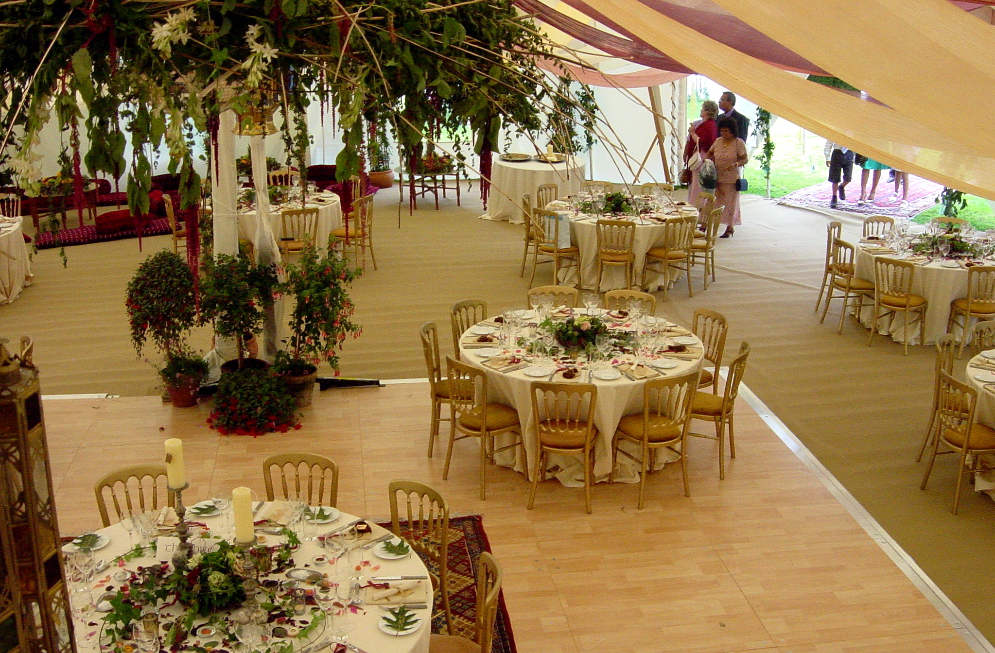 Marquee interior with elegant table dressing and decoration